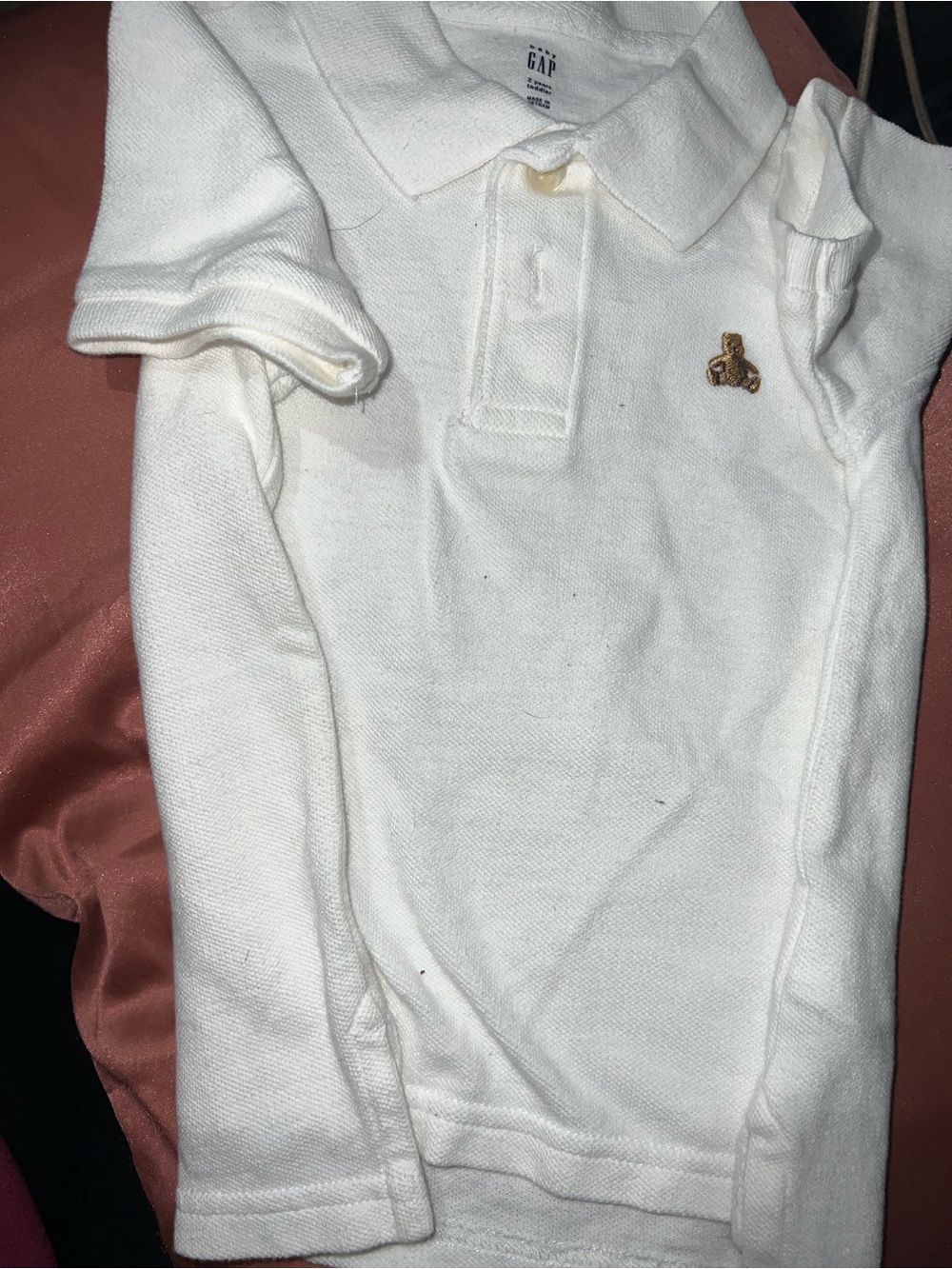 GAP White Polo with Small Gold Crest Embroidery